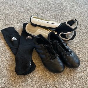 Soccer cleats, socks, and shin guards.